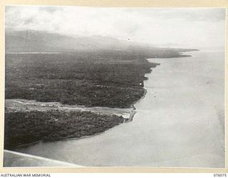 LAE, NEW GUINEA. 1944-09-19. THE BUSO RIVER LOOKING EAST TOWARDS FINSCHHAFEN WITH THE FINISTERRE RANGE IN THE BACKGROUND