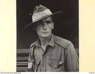 NEW GUINEA, 1944-01-30. VX90176 SERGEANT R.J. BUCHANAN (1) OF THE MILITARY HISTORY SECTION