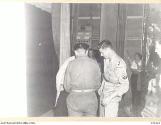 LAE, NEW GUINEA. 1944-08-17. SERGEANT J. DEATON, UNITED STATES ARMY ALLIED TRANSLATOR AND INTERPRETER SECTION, ATTACHED TO HEADQUARTERS, NEW GUINEA FORCE, ASSISTING IN THE PLAY, "THE WHITE HORSE ..