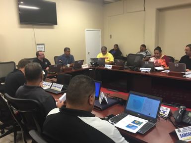 Emergency managers coordinate in the American Samoa Emergency Operations Center to prepare for Amos.