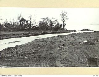 MILNE BAY, NEW GUINEA. 1944-07-19. THE LOCALITY WHERE QX1071 CORPORAL J.A. FRENCH VC, 2/9TH INFANTRY BATTALION, WON HIS POSTHUMOUS DECORATION. THIS IMAGE JOINS PHOTOGRAPH NO. 74701