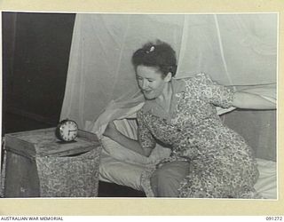 TOROKINA, BOUGAINVILLE. 1945-04-20. SISTER B.M. FOLEY, AUSTRALIAN ARMY NURSING SERVICE, 2/1 GENERAL HOSPITAL, ABOUT TO TAKE UP MORNING DUTIES