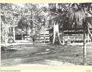 LAE, NEW GUINEA. 1944-06-02. THE CAMP AREA AT HEADQUARTERS NEW GUINEA FORCE. THE OFFICE OF G SECTION, (AIR), IS LOCATED WITHIN THE G SECTION (OPERATIONS) HUT AT THE RIGHT