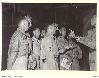 LAE AREA, NEW GUINEA, 1945-06-05. A CONCERT WAS GIVEN AT THE OPEN AIR THEATRE OF 2/7 GENERAL HOSPITAL. THE ENTERTAINERS WERE FROM STAFF OF 2/7 GENERAL HOSPITAL, LAE CHORAL GROUP AND THE LAE PLAY ..