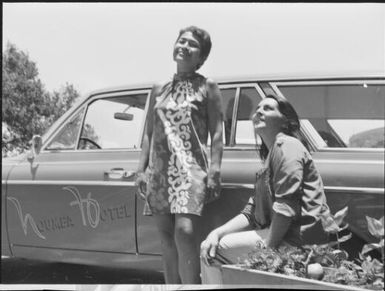 Noumea girls next to the Noumea Hotel car, Noumea, New Caledonia, 1967 / Michael Terry