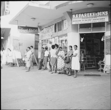 Fijians standing in front of souvenir shop, Fiji, November 1966 / Michael Terry