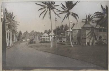 View of road with large buildings, Rabaul, New Guinea, approximately 1914