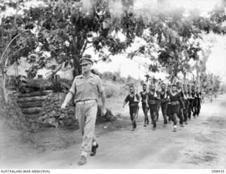 KAVIENG, NEW IRELAND. 1945-10-19. AN AUSTRALIAN NEW GUINEA ADMINISTRATIVE UNIT ADMINISTRATIVE HEADQUARTERS WAS SET UP AT KAVIENG WITH CAPTAIN F.N.W. SHAND, ANGAU DISTRICT OFFICER IN CHARGE, TO ..