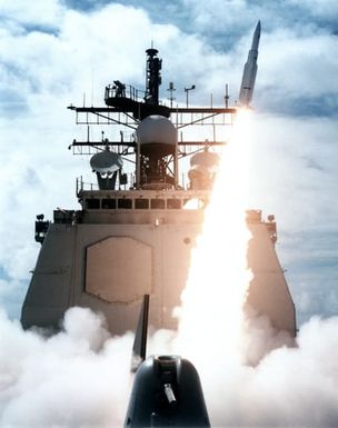 Copy negative of the US Navy (USN) Ticonderoga Class Cruiser USS VINCENNES (CG 49) launching a Standard Missile-2 (SM-2) Medium Range (MR) from its deck