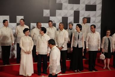 Barack Obama joins Asia Pacific Economic Cooperation Summit leaders and spouses for a group photo in Pasay, Metro Manila, Philippines, November 18, 2015