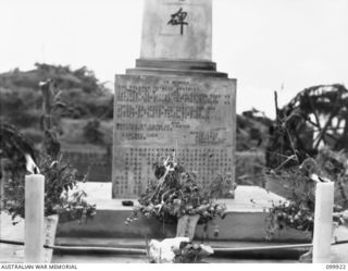 RABAUL, NEW BRITAIN, 1946-03-16. OF THE 653 CHINESE WHO DIED WHILST CAPTIVES OF THE JAPANESE, 259 WERE RE-INTERRED IN A CHINESE CEMETERY AT RABAUL. THE NEAT GROUNDS, ROWS OF MARKED GRAVES AND AN ..