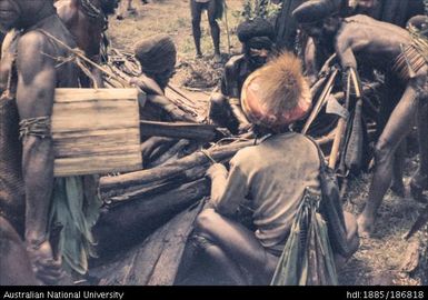 Mendi people working with wood