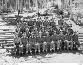 MADANG, NEW GUINEA. 1944-06-17. GROUP PORTRAIT OF OFFICERS OF 58/59TH INFANTRY BATTALION. THE UNIT IS LOCATED AT SIAR PLANTATION. LEFT TO RIGHT: FRONT ROW: VX114134 CAPTAIN (CAPT) J. L. HOCKING; ..