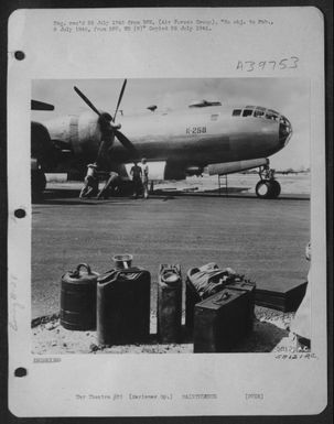 Mechanics Pull The Prop Through On A Boeing B-29 Superfortress, The First To Be Overhauled At The Guam Air Depot In The Marianas Gp. (U.S. Air Force Number 58121AC)