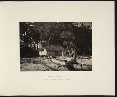 Boy with fish, Rarotonga, Cook Islands