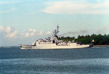 A port beam view of the French frigate FS LIEUTENANT DE VAISSEAU LAVALLEE (F 790) departing Pearl Harbor.