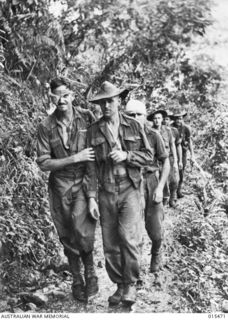 1943-08-09. NEW GUINEA. AS THE BATTLE FOR MOUNT TAMBU NEAR SALAMAUA. GOES ON, AUSTRALIANS VETERANS REALISE THEY HAVE NEVER FOUGHT A NASTIER COMBINATION THAN THE JUNGLE AND THE JAPANESE. HERE ARE ..