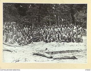 BOUGAINVILLE ISLAND, 1945-01-21. PERSONNEL OF NO.4 BATTERY, 2ND FIELD REGIMENT, IN FRONT OF ONE OF THEIR SHORT 25 POUNDERS