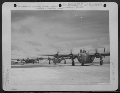 Consolidated B-24 Liberators Of The 11Th Bomb Group, Warming Up Motors Prior To Take Off On Mission From Kwajalein, Marshall Islands, July 1944. (U.S. Air Force Number B63804AC)