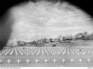 Berry airstrip, New Guinea. 1944-05-09. A section of the Bomana War Cemetery conducted by 1 Graves Registration Unit. Australians and members of the Papuan Infantry Battalion are buried here
