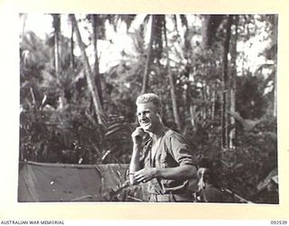 BOUGAINVILLE. 1945-05-24. CAPTAIN K.R.G. COLEMAN, OFFICER COMMANDING D COMPANY, 26 INFANTRY BATTALION (AUSTRALIAN IMPERIAL FORCE), TAKES TIME OFF FOR A SHAVE PRIOR TO SETTING OUT ON PATROL IN THE ..