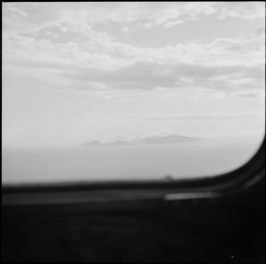 View of Vanua Levu out of a window of a plane, Fiji, 1966 / Michael Terry