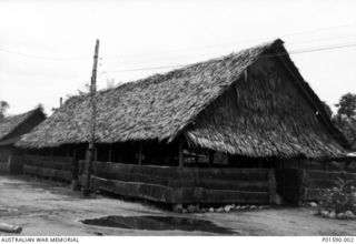 TADJI AIRSTRIP, AITAPE, NEW GUINEA. C.1944-06. OFFICERS MESS CONSTRUCTED OF LOCAL MATERIALS AND USED BY MEMBERS OF THE RAAF INCLUDING NO. 100 SQUADRON