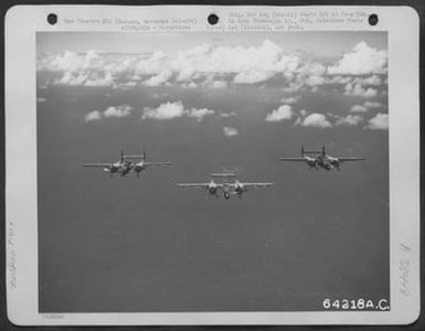 Northrop P-61 'Black Widows' In Flight. Saipan, Marianas Islands, January, 1945 (U.S. Air Force Number 64218AC)