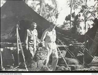 AITAPE, NORTH EAST NEW GUINEA. 1944-05-02. GENERAL DOUGLAS MACARTHUR LEAVING A TENT AFTER INSPECTING THE WORK OF RAAF ENGINEERS ON THE TADJI AIRSTRIP