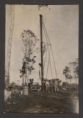 [Group of Men at Well]