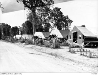 TOROKINA, BOUGAINVILLE ISLAND, SOLOMON ISLANDS. 1945-08-25. THE AIRMENS' LINES OF NO. 7 AIRFIELD CONSTRUCTION SQUADRON RAAF. NOTE THE WELL KEPT GARDENS IN FRONT OF EACH TENT