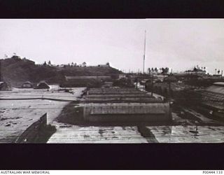ADMIRALTY ISLANDS 1947-07. GENERAL VIEW OF THE NAVAL STORES DEPOT AT LORENGAU. (NAVAL HISTORICAL COLLECTION)