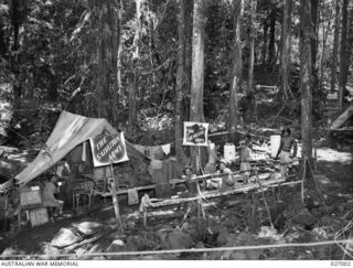 PAPUA, NEW GUINEA. 1942-09. THE SALVATION ARMY IN A FORWARD AREA OF THE OWEN STANLEY RANGES. THIS VERY WELCOME TENT, NEAR UBERI, WITH ITS WELCOME CUP OF COFFEE AND BISCUITS, WAS A GREAT BOON TO ..