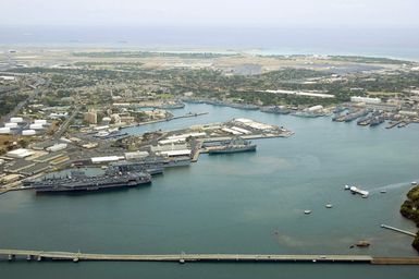 The US Navy (USN) Nimitz Class Aircraft Carrier USS ABRAHAM LINCOLN (CVN 72) (foreground left), is pictured among the multi-national ships moored side-by-side at Naval Base (NB) Pearl Harbor, Hawaii (HI), while participating the Rim of the Pacific (RIMPAC) 2006 Exercise, the world's largest biennial maritime exercise. RIMPAC 2006 brings together military forces from Australia, Canada, Chile, Peru, Japan, the Republic of Korea, the United Kingdom and the US