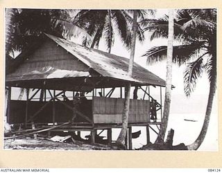 MALMAL VILLAGE, JACQUINOT BAY. NEW BRITAIN. 1944-12-09. A HOUSE UNDER CONSTRUCTION AT THE WATERFRONT FOR THE GENERAL OFFICER COMMANDING HEADQUARTERS 5 DIVISION