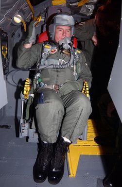 US Air Force (USAF) Major (MAJ) General (GEN) Mike DeCuir, Director of Air and Space Operations (ASO), Headquarters Air Combat Command (ACC), Langley Air Force Base (AFB), Virginia (VA), receives training on an ejection seat at Barksdale Air Force Base's new B-52H Stratofortress egress trainer in preparation for a flight to Andersen AFB, Guam (GU)