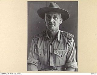 LAE, NEW GUINEA. 1945-10-04. LIEUTENANT COLONEL R. ANDREWS, ASSISTANT DIRECTOR OF ORDNANCE SERVICE, HEADQUARTERS FIRST ARMY