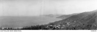 Port Moresby, Papua. 1942-07-15. A view from above the township overlooking Ela Beach, Walter Bay and towards Kila Kila Hill