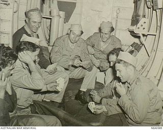 Dutch New Guinea. 1944-09-22. American GI passengers aboard Martin PBM Mariner flying boat aircraft, serial no. A70-5, of No. 41 (Transport Sea) Squadron RAAF based at Cairns, flying from Port ..