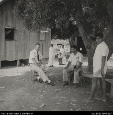 Officer speaking workers