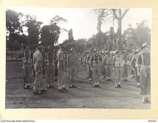 TOROKINA, BOUGAINVILLE, 1945-08-18. SPECIAL PARADE OF B CORPS SIGNALS WHICH WON BOTH THE LOCAL CRICKET AND AUSTRALIAN RULES FOOTBALL COMPETITIONS HELD IN 2 CORPS AREA. SHOWN, LIEUTENANT-COLONEL ..