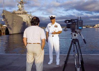 U.S. Navy MASTER CHIEF PETTY Officer of the Navy (MCPON) Joe R. Campa Jr., is interviewed on a pier by the Hawaii Navy News on Oct. 30, 2006. MCPON Campa is currently in the Hawaii region visiting local Navy commands and Sailors. (U.S. Navy PHOTO by Mass Communication SPECIALIST 3rd Class Ben A. Gonzales) (Released)