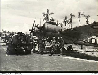 LOS NEGROS ISLAND, ADMIRALTY ISLANDS. 1944-03-28. A BEAUFIGHTER AIRCRAFT FROM NO. 30 SQUADRON RAAF BEING REFUELLED AT MOMOTE AIRSTRIP AFTER ESCORTING AIRCRAFT OF NO. 79 (SPITFIRE) SQUADRON RAAF ..