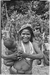 Woman holds infant