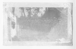 [Group of Servicemen Standing Outside a Tented Building]