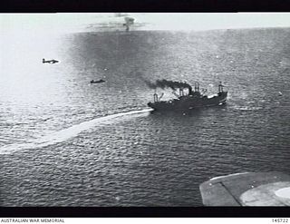 Lae area, New Guinea. 1943-03-03. Allied aircraft about to attack an enemy vessel which is taking evasive action. The photograph is taken from a height of approximately 1,000 feet
