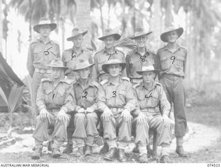 MADANG, NEW GUINEA. 1944-07-04. OFFICERS OF THE 24TH INFANTRY BATTALION. IDENTIFIED PERSONNEL ARE:- VX104151 LIEUTENANT A.W.C. BUNSELL, ADJUTANT (1); VX57 MAJOR A.K. CARROLL, SECOND IN CHARGE (2); ..