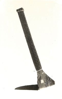 Photo of a carved adze (4310-2)