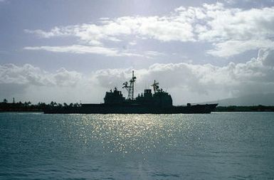 A starboard beam view of the guided missile cruiser USS CHOSIN (CG-65) underway in the channel as it arrives at the naval station.