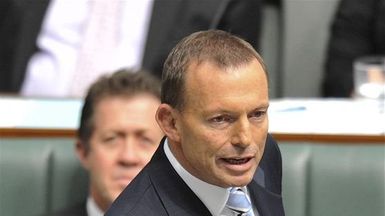 Abbott hardens language on asylum deal